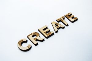 Block Letters spelling the word, CREATE against a solid white background.